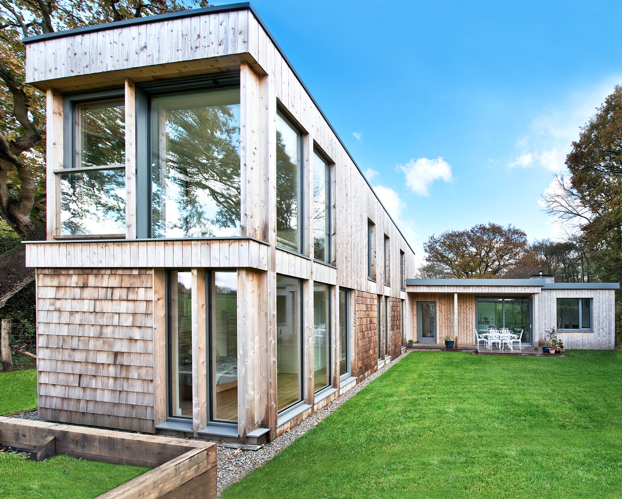 External view of a triple-glazed, aluminum-clad timber window in a contemporary countryside new build.