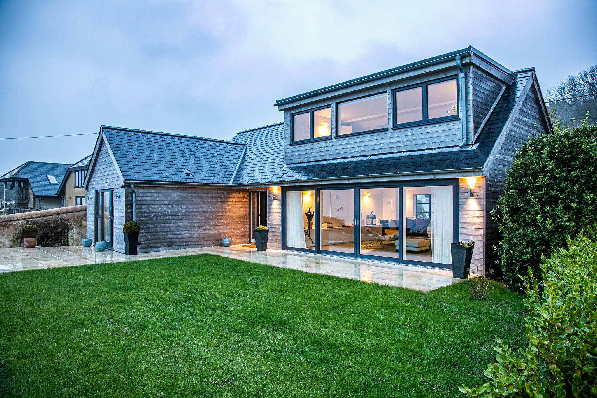 Front elevation view of double-glazed features in a coastline renovation.