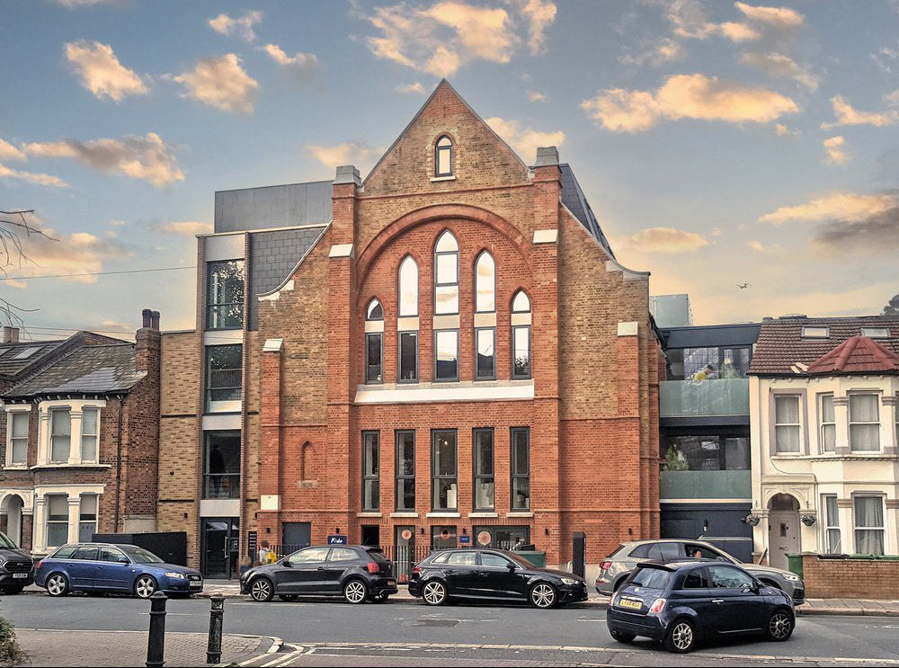 Front elevation view of double-glazed features in a revitalized residential development.