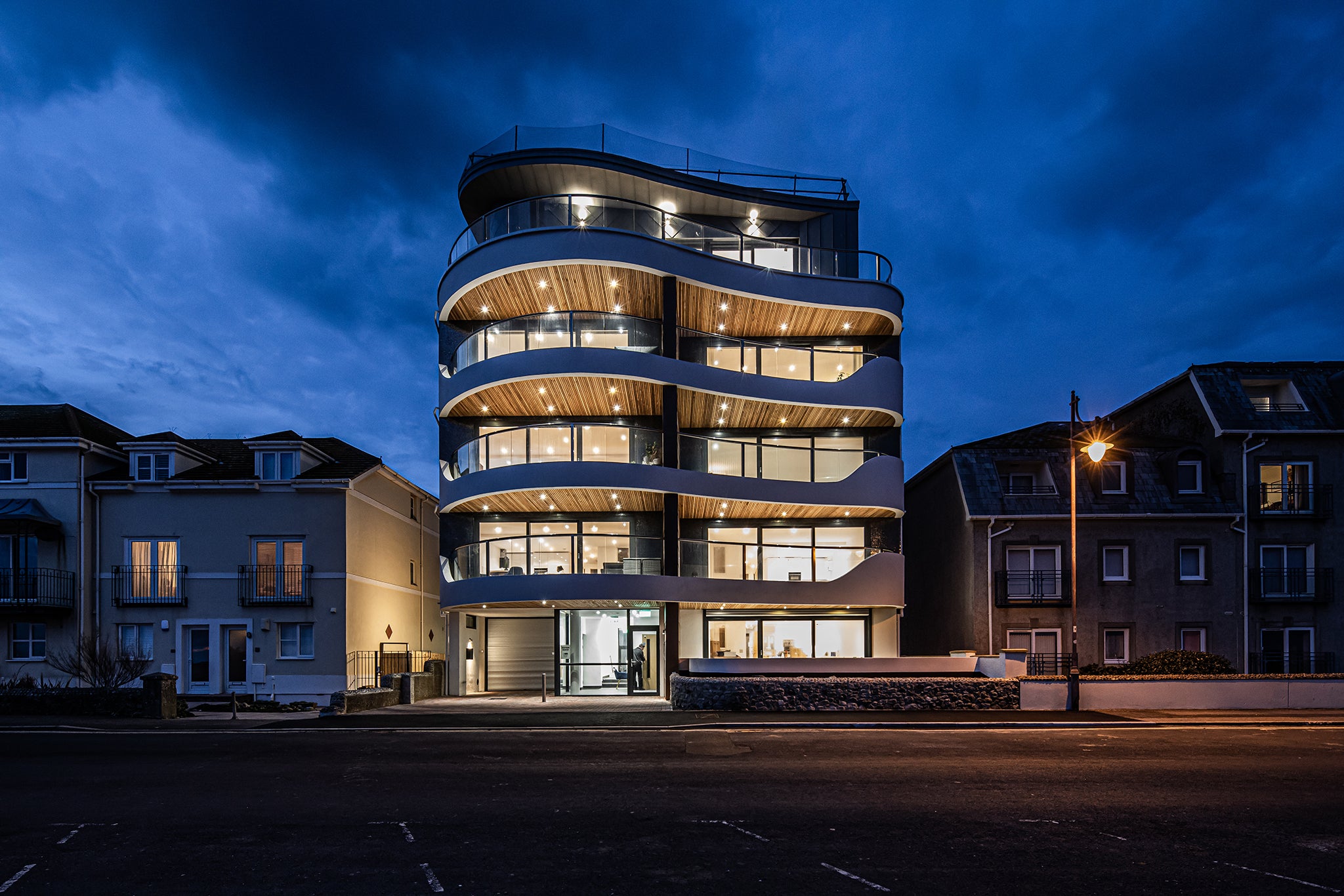 Front elevation view of triple-glazed features in passive house apartments.