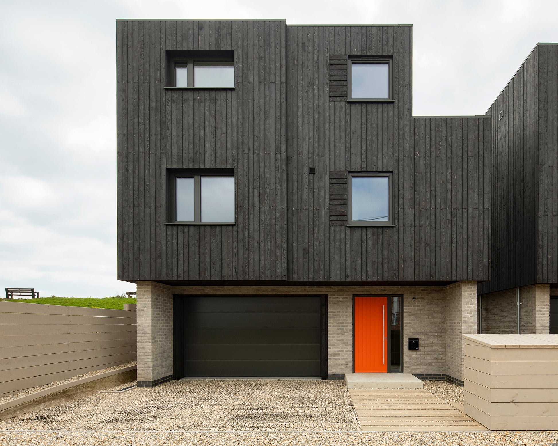 Rear elevation view of a triple-glazed panel door in coastal seaside property.