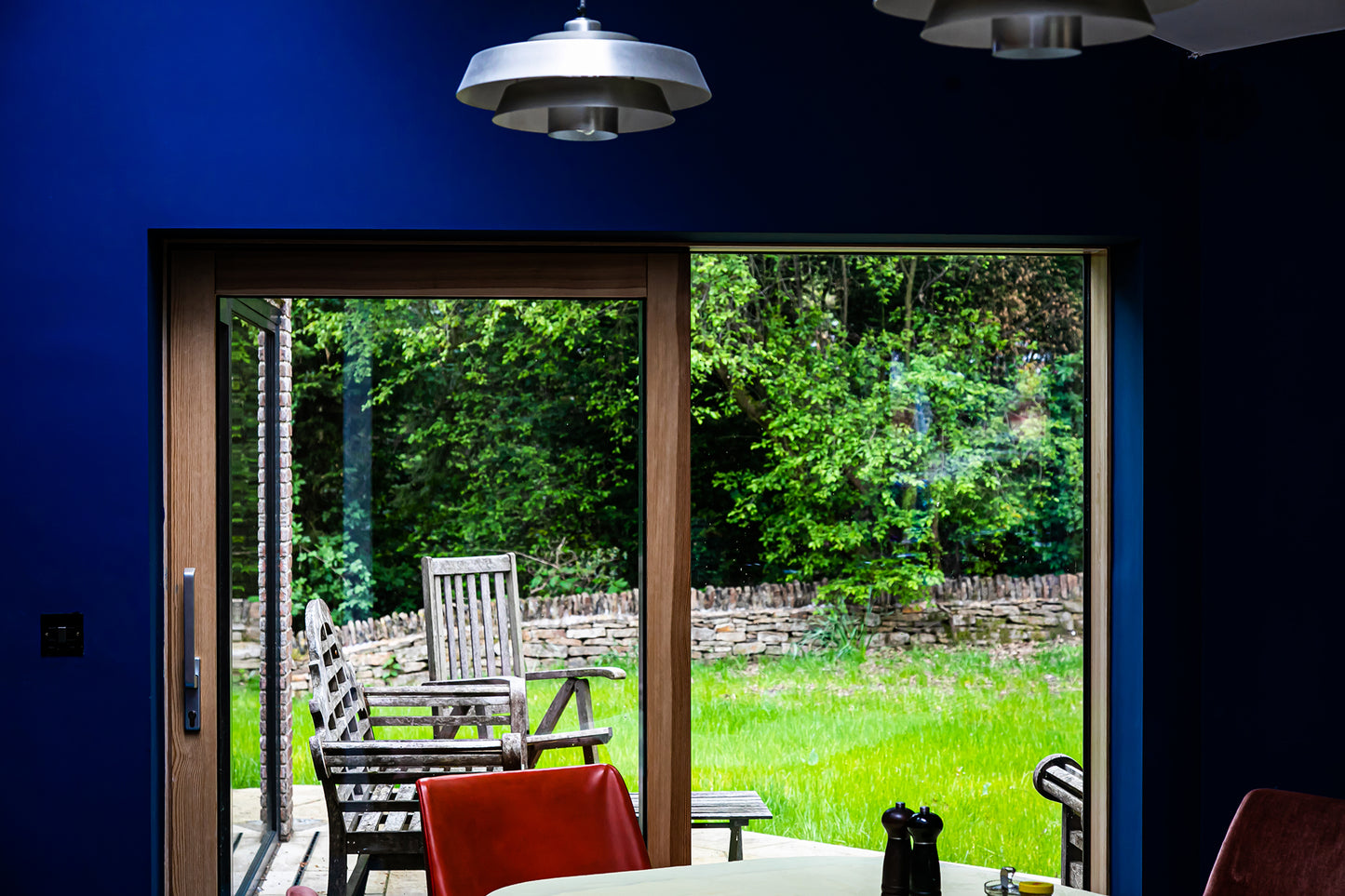 Interior view of a triple-glazed Enerphit sliding door in a high-performance retrofit.