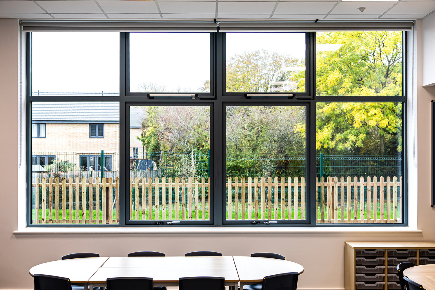 Internal view of a triple-glazed, aluminum-clad window in a passive house school.