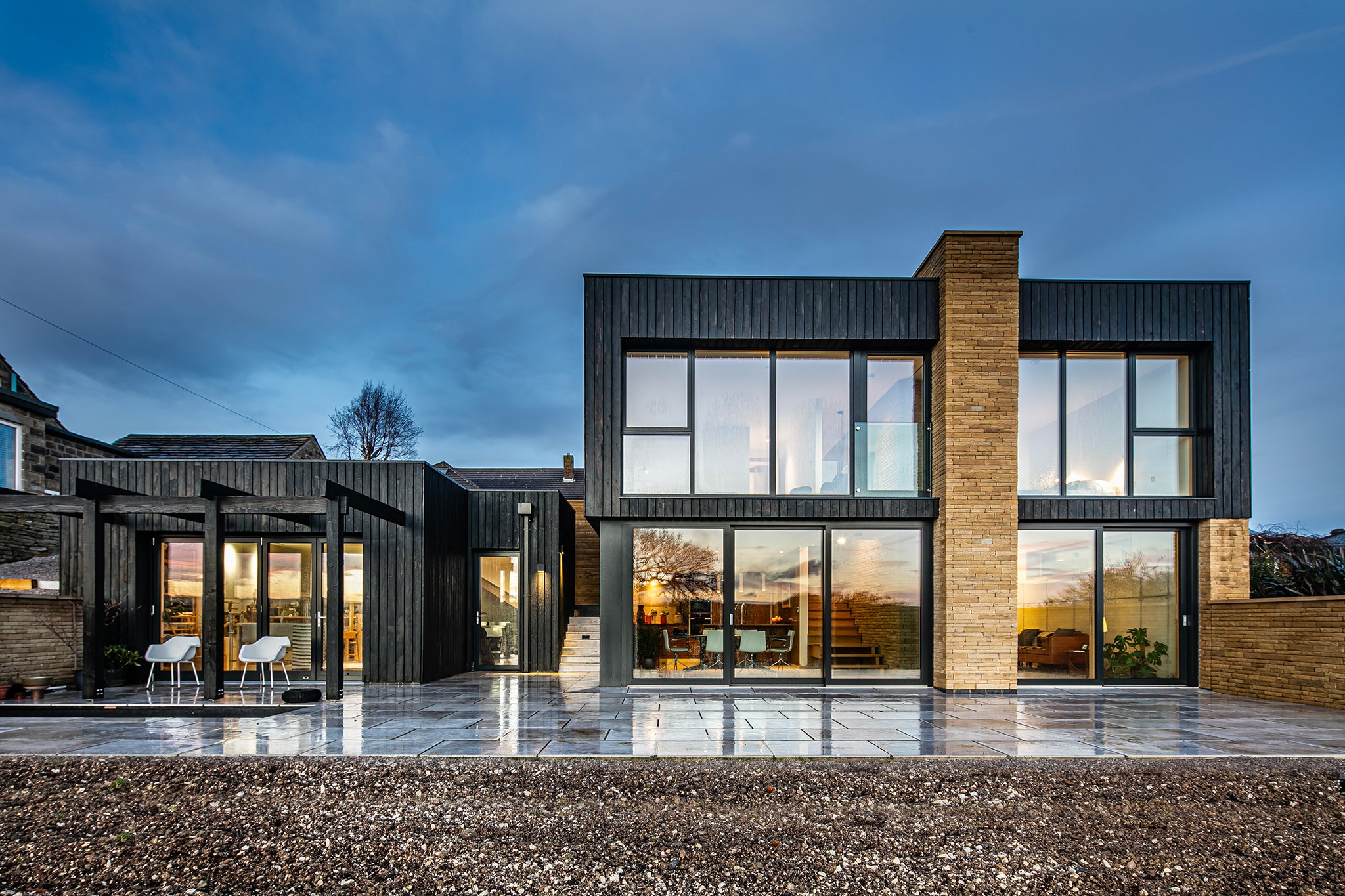 Front elevation view of triple-glazed features in a creative passive house.