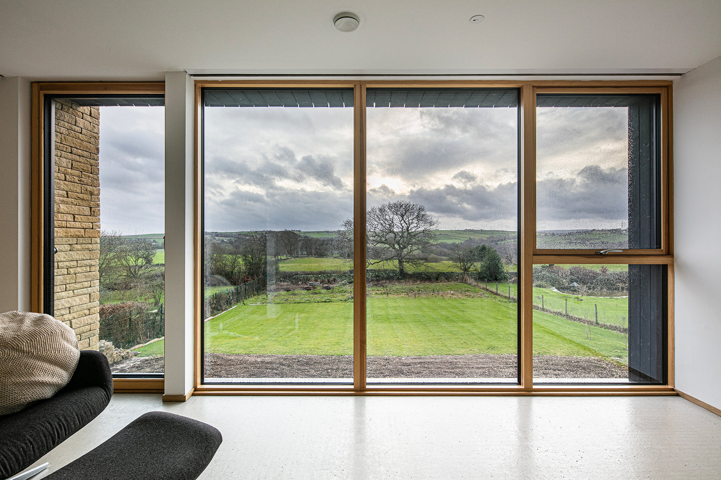 Internal view of a triple-glazed tilt-turn window in a creative passive house.