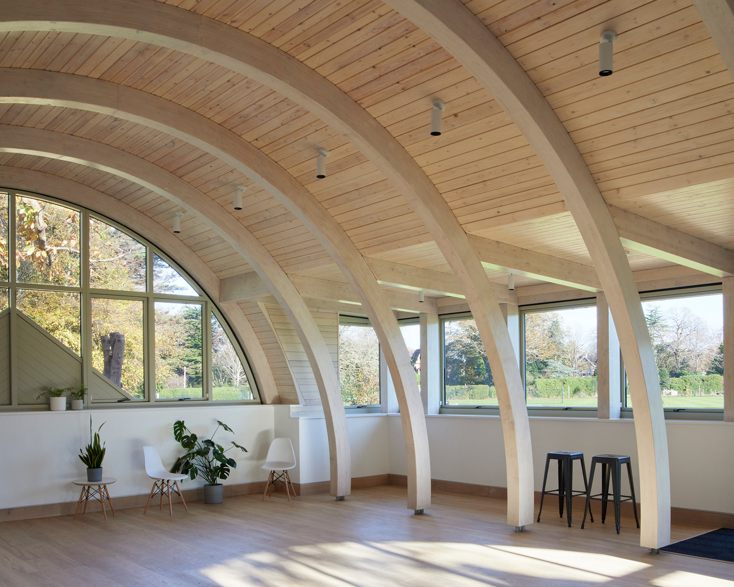 Internal view of a double-glazed timber outward-opening window in a cricket heritage restoration.